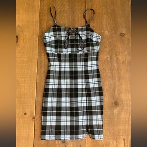 Blue and black Fashion Nova mini dress. Small leg slit. New with tags.